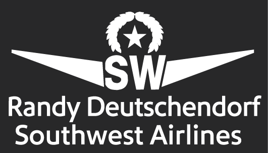 A black and white name badge featuring the Southwest Airlines logo and a custom embroidered name.