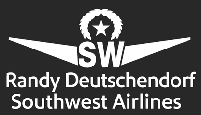 A black and white name badge featuring the Southwest Airlines logo and a custom embroidered name.

