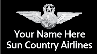 A name badge for Sun Country Airlines with a placeholder for 'YOUR NAME HERE' and the airline's logo featuring wings and a star.
